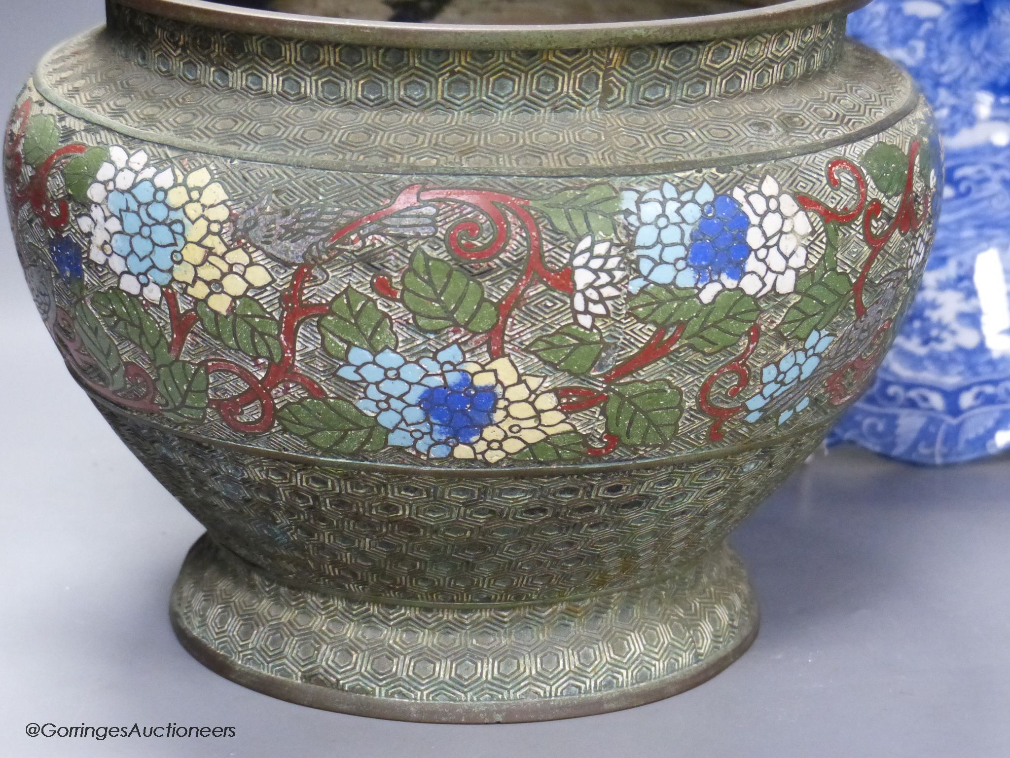 A Japanese blue and white charger, diameter 46cm, and a champleve enamel jardiniere